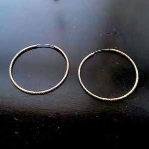 Thin gold hoop earrings